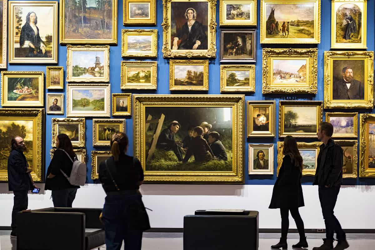 Visitors looking at art in the Winnipeg Art Gallery