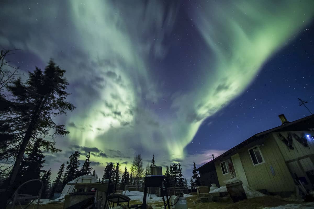 Northern Lights dance over the Aurora Inn in Churchill